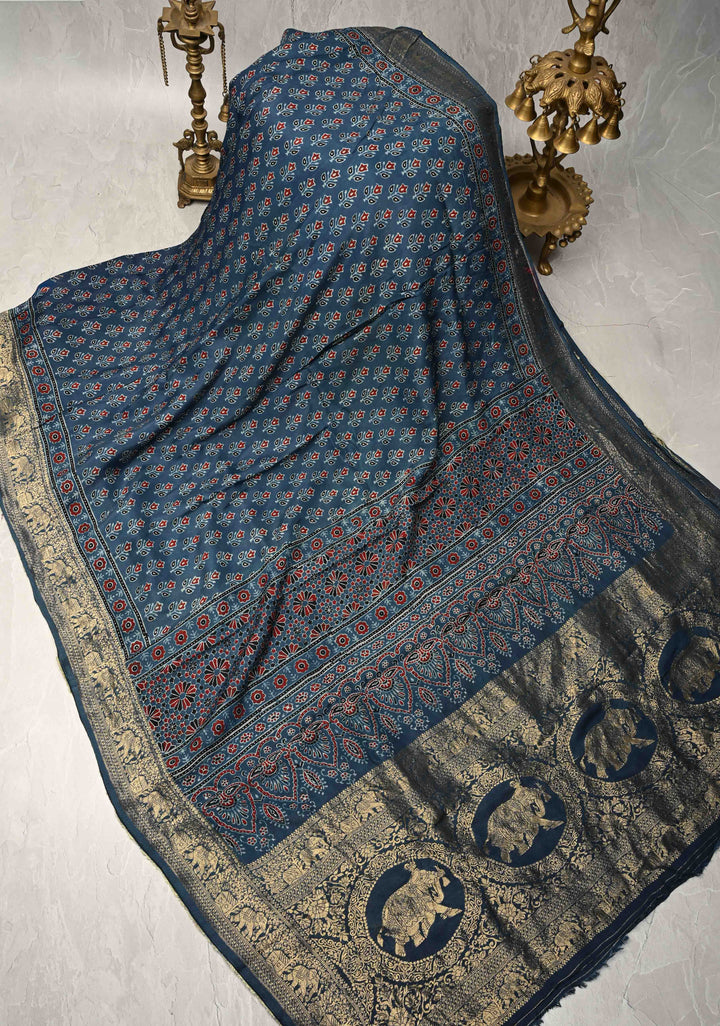 Indigo Ajrakh Hand Block Print on Dola Silk Saree with Fancy Zari Border and Elephant Motifs on Pallu