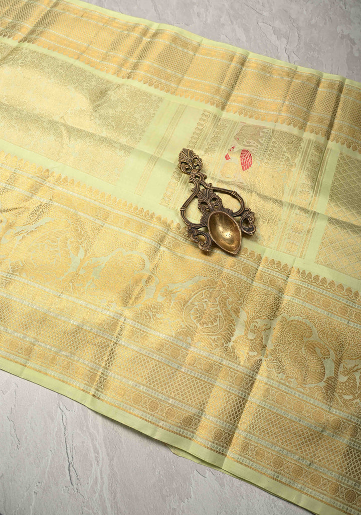 Pastel Green Pure Gadwal Silk Saree with Floral Brocade and Zari Border | SILK MARK CERTIFIED