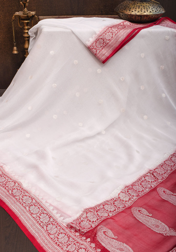 Pure Silk Chiffon Saree in White with Silver Tone Zari Buttas & Red Border | SILK MARK CERTIFIED