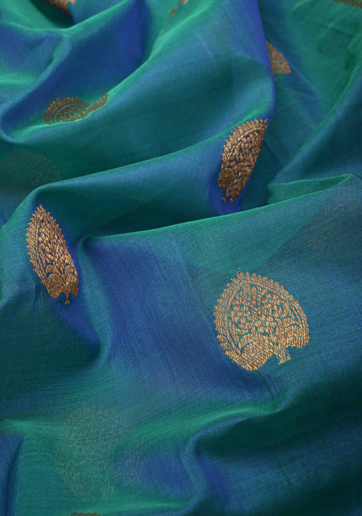Exquisite Banarasi Kora Silk Saree with antique Zari Motifs and Border in Peacock blue And Green Dual Tone  | SILK MARK CERTIFIED