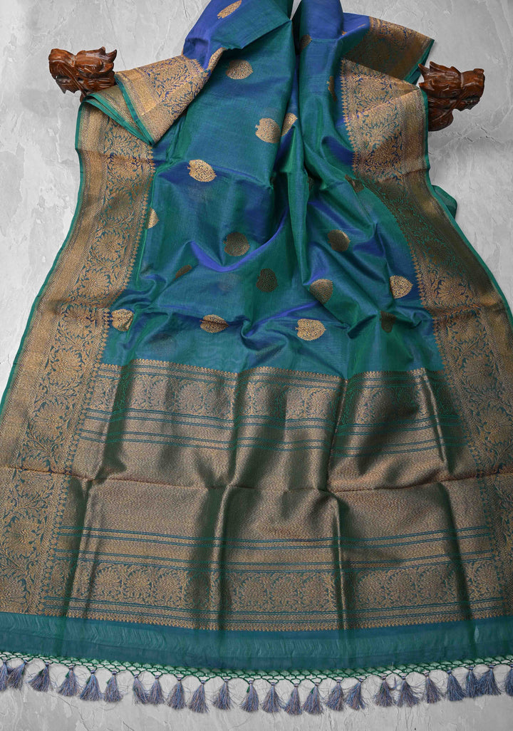 Exquisite Banarasi Kora Silk Saree with antique Zari Motifs and Border in Peacock blue And Green Dual Tone  | SILK MARK CERTIFIED