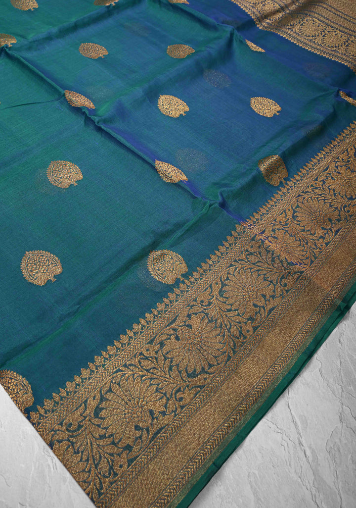 Exquisite Banarasi Kora Silk Saree with antique Zari Motifs and Border in Peacock blue And Green Dual Tone  | SILK MARK CERTIFIED