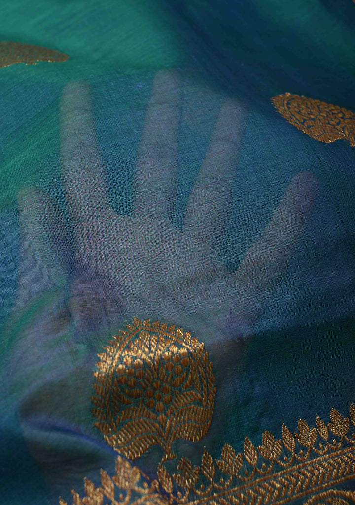 Exquisite Banarasi Kora Silk Saree with antique Zari Motifs and Border in Peacock blue And Green Dual Tone  | SILK MARK CERTIFIED