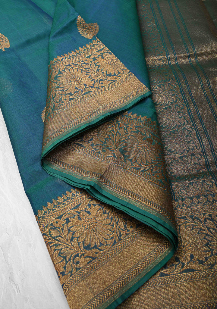 Exquisite Banarasi Kora Silk Saree with antique Zari Motifs and Border in Peacock blue And Green Dual Tone  | SILK MARK CERTIFIED