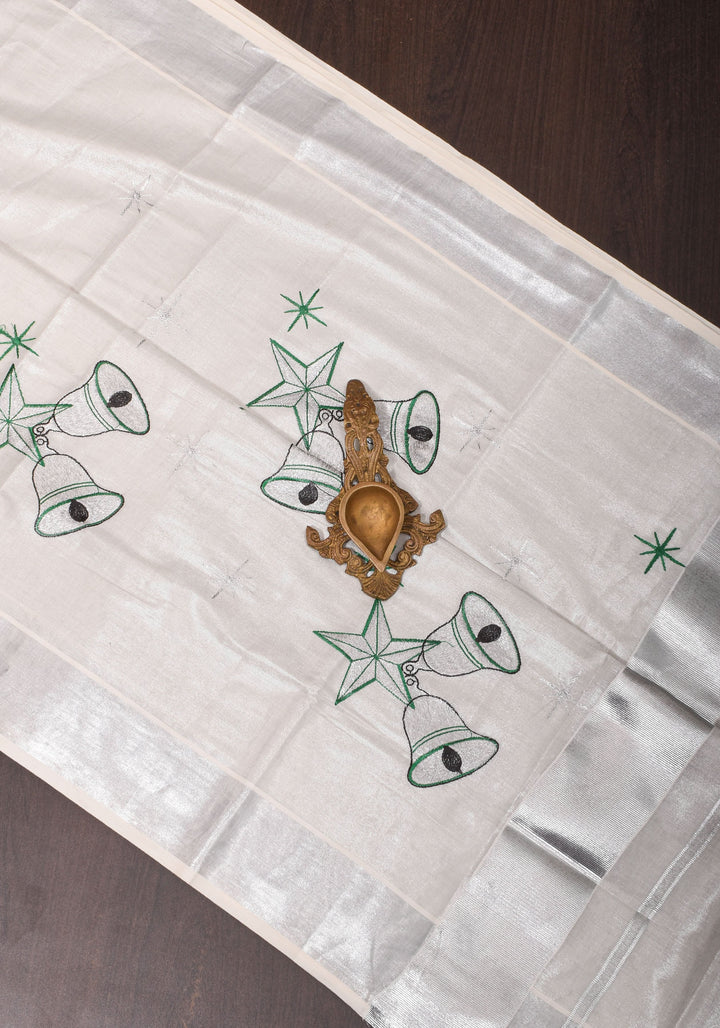 Kerala Tissue Cotton Saree with bells and stars motifs and Zari Border
