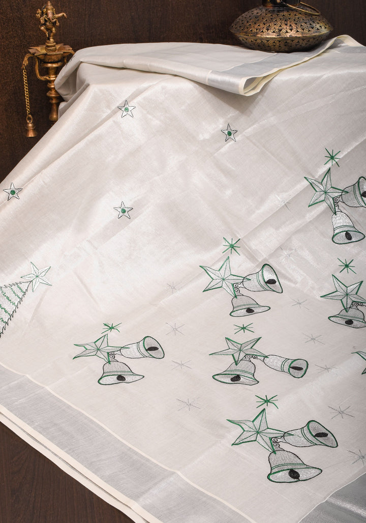 Kerala Tissue Cotton Saree with bells and stars motifs and Zari Border