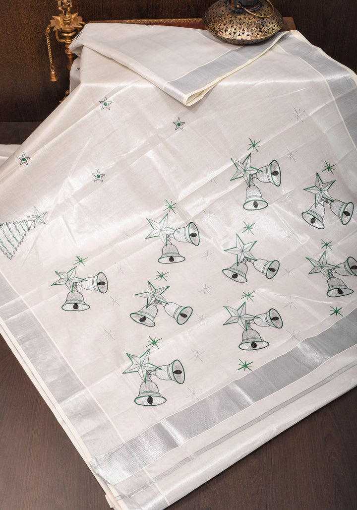 Kerala Tissue Cotton Saree with bells and stars motifs and Zari Border