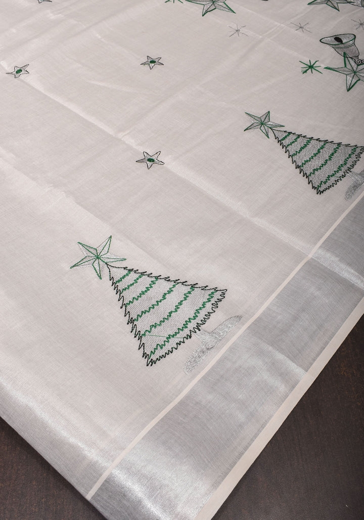 Kerala Tissue Cotton Saree with bells and stars motifs and Zari Border