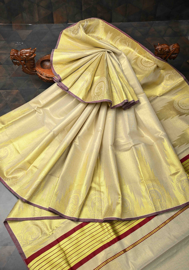 Beige Tissue Cotton Saree with Distinct Peacock On Temple Border