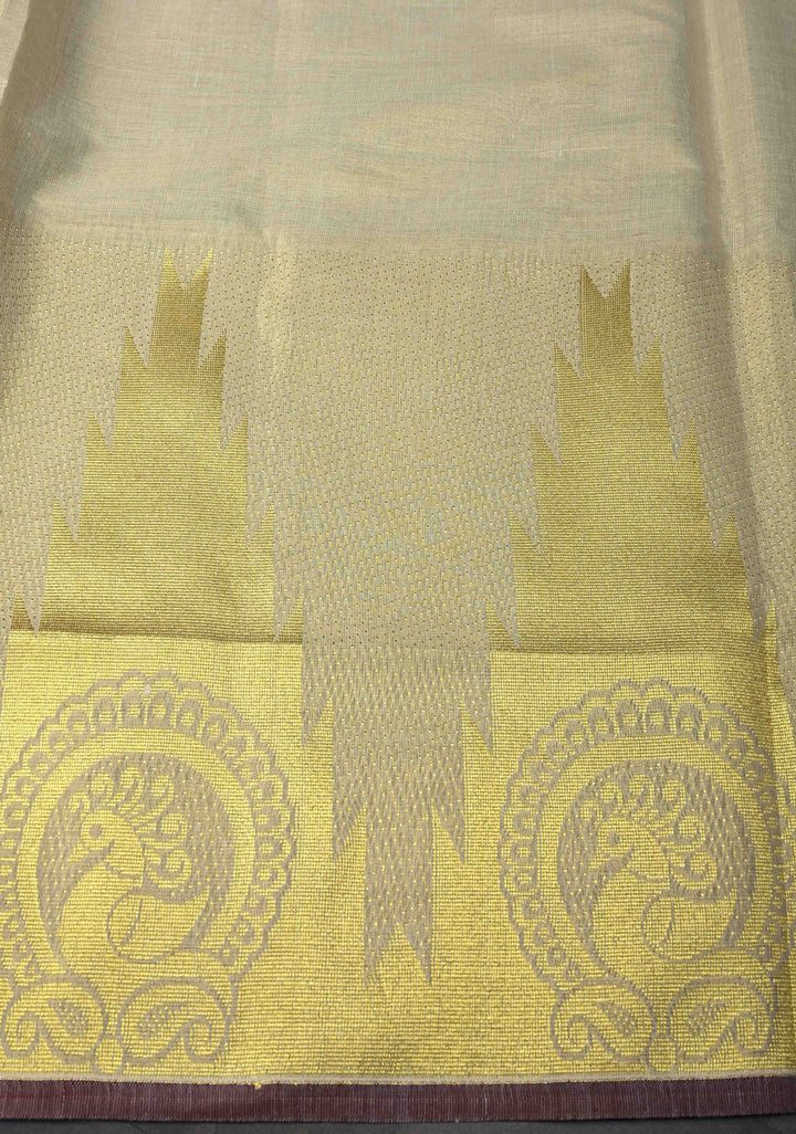 Beige Tissue Cotton Saree with Distinct Peacock On Temple Border