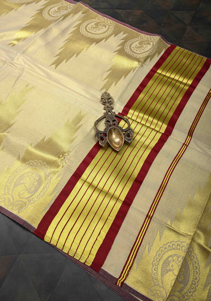 Beige Tissue Cotton Saree with Distinct Peacock On Temple Border