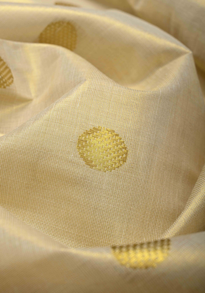 Beige Tissue Cotton Saree with Zari Coin Buttis And Temple Border