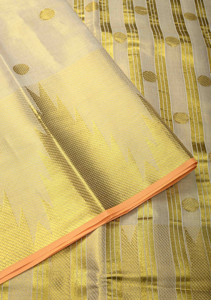 Beige Tissue Cotton Saree with Zari Coin Buttis And Temple Border