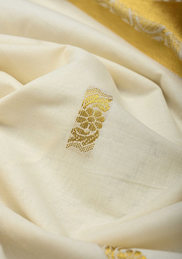Off White Kerala Kasavu Cotton Saree with Floral Buttas and Zari Border