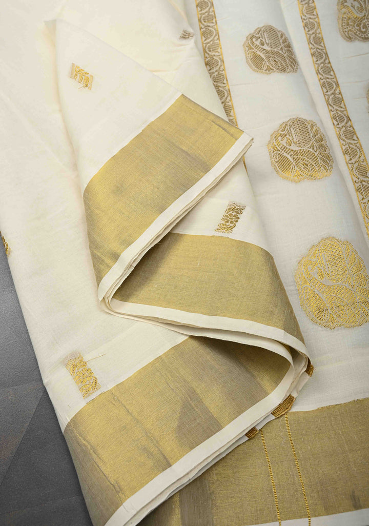 Off White Kerala Kasavu Cotton Saree with Floral Buttas and Zari Border