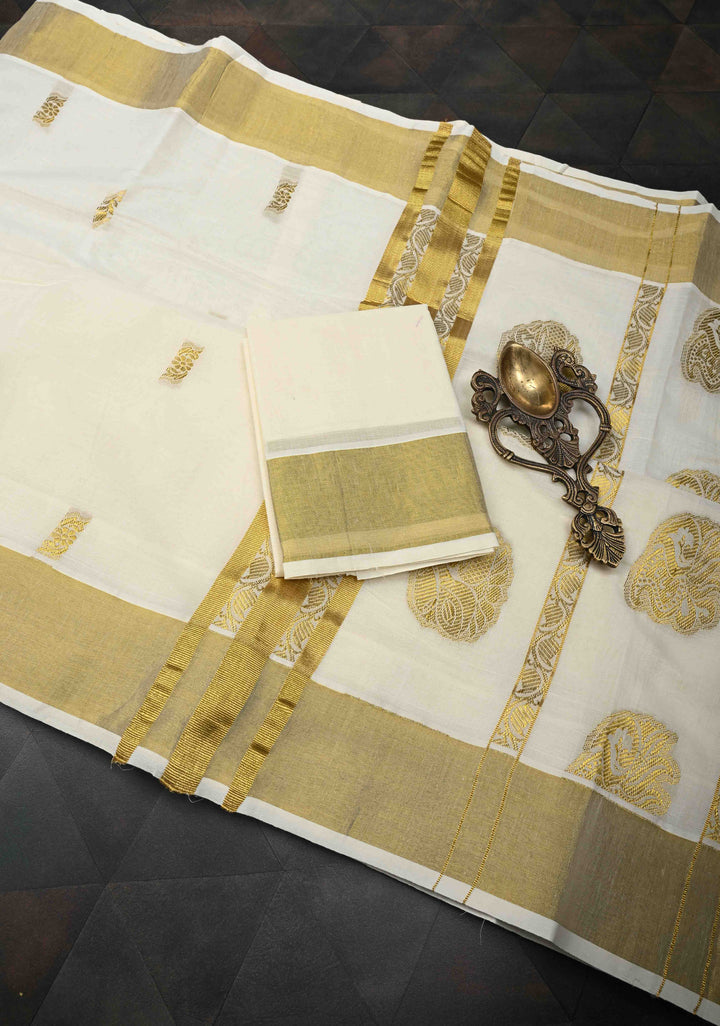 Off White Kerala Kasavu Cotton Saree with Floral Buttas and Zari Border