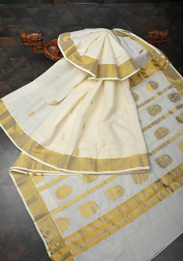 Off White Kerala Kasavu Cotton Saree with Floral Buttas and Zari Border