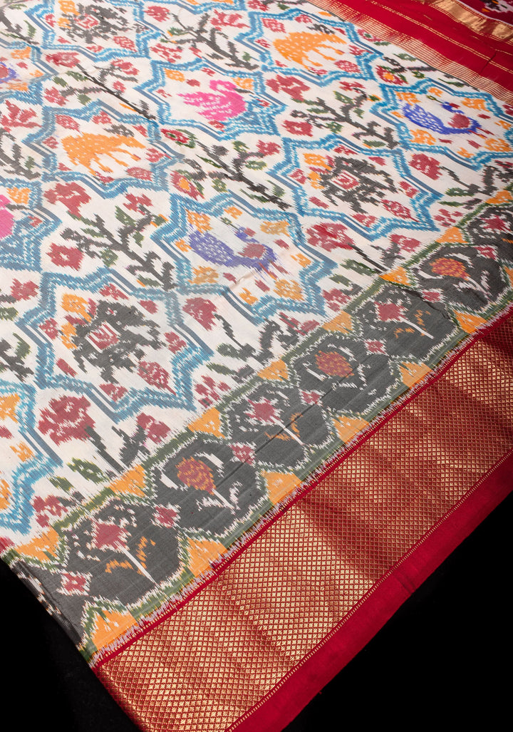 White Ikkat Patola Moroccan Design Pure Silk Tissue Saree with Contrast Red Zari Border | SILK MARK CERTIFIED