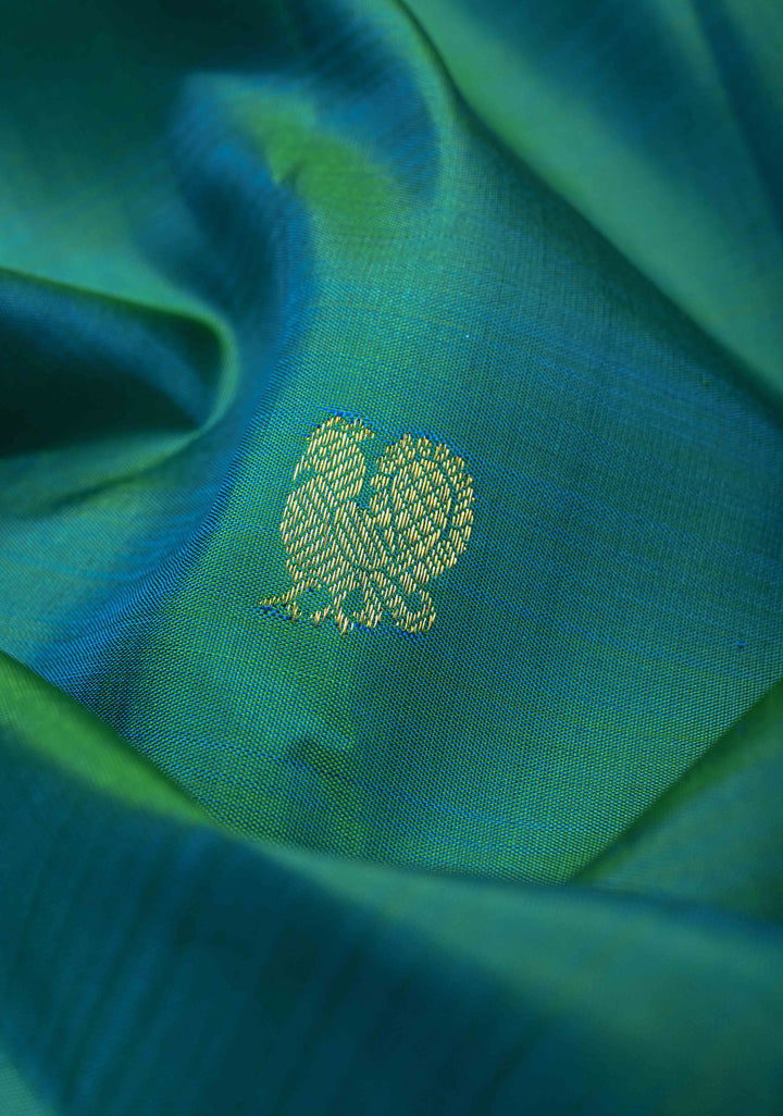 Green Dual tone Kanjivaram Pure silk saree with Zari Buttas and Distinct Vanasingaram Mandala Motifs on Contrast Border | SILK MARK CERTIFIED
