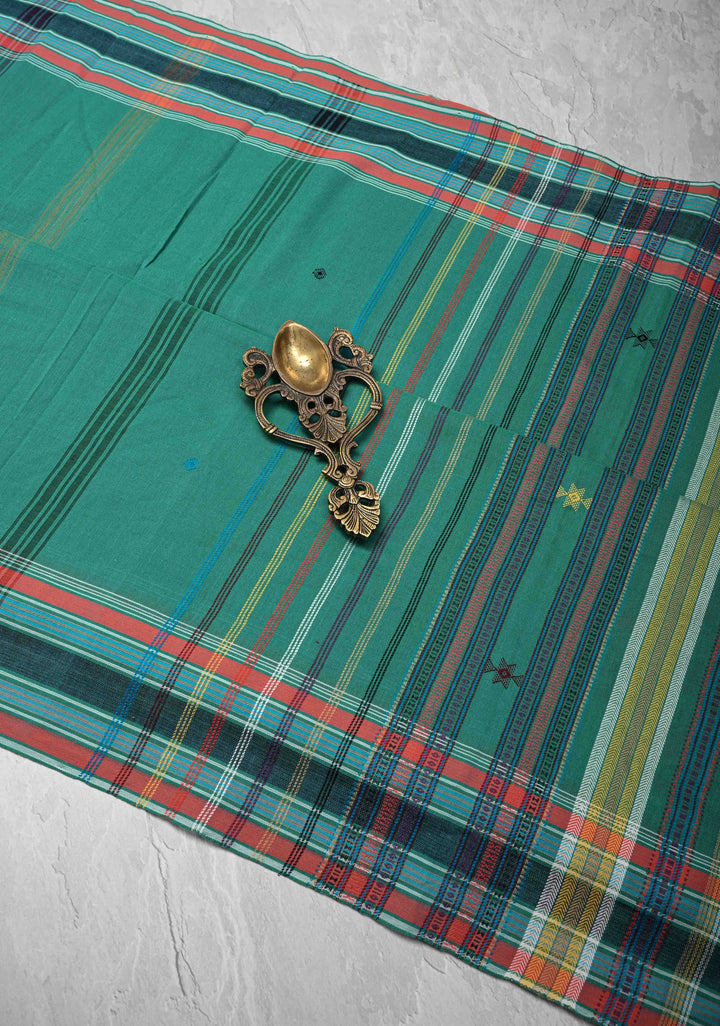 Green Handloom Bhujodi Kala Cotton Saree with buttas and honeycomb tassels