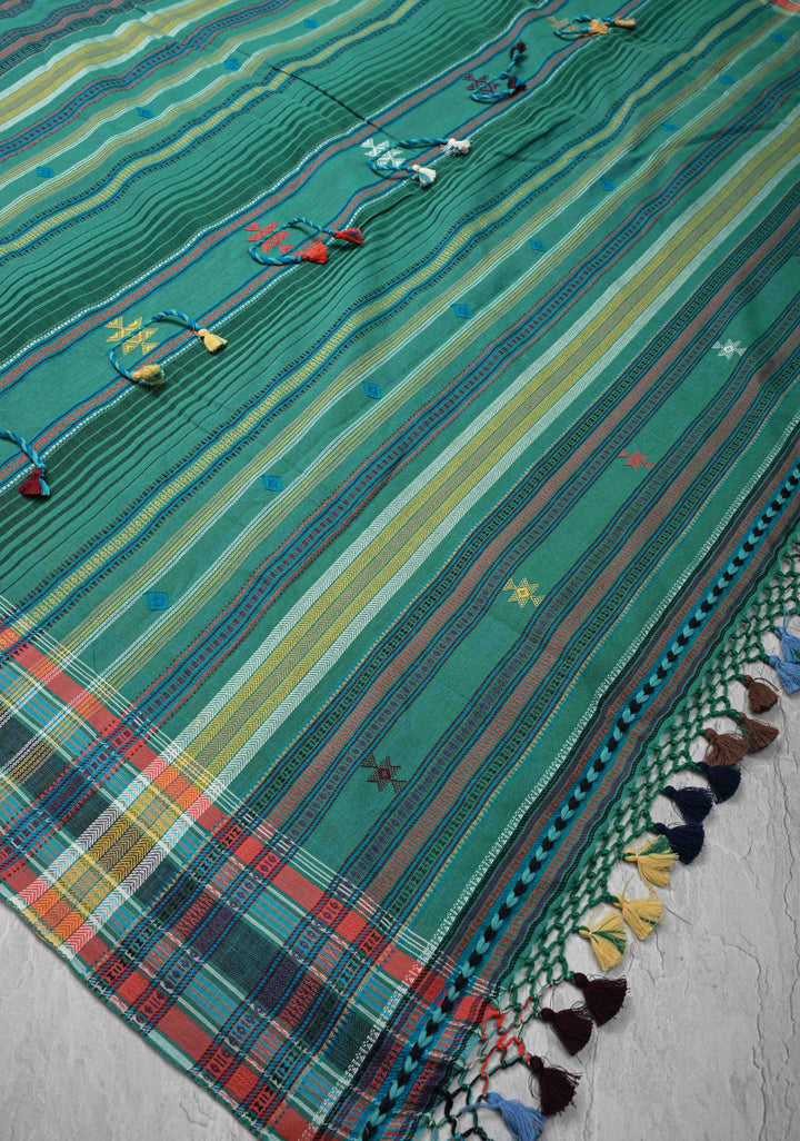 Green Handloom Bhujodi Kala Cotton Saree with buttas and honeycomb tassels