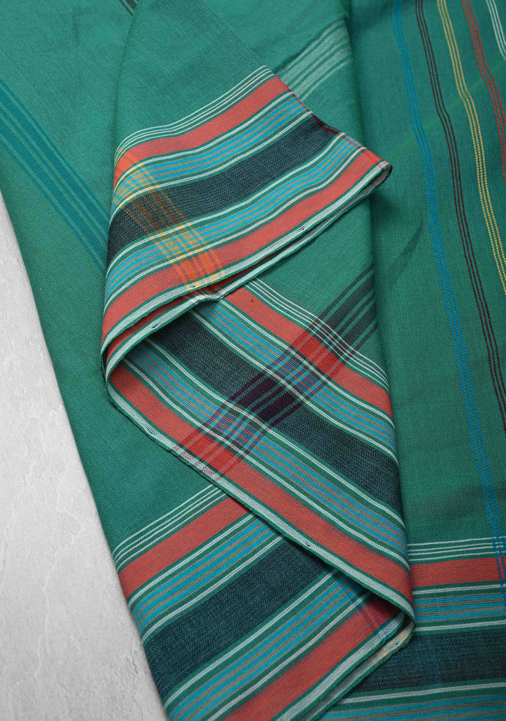 Green Handloom Bhujodi Kala Cotton Saree with buttas and honeycomb tassels