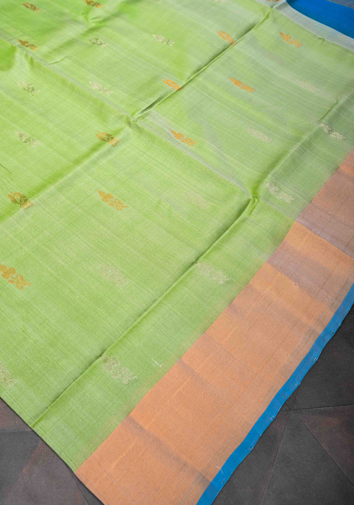 Tea Green Uppada Handloom Silk Saree With Sona Rupa Buttas And Zari Border