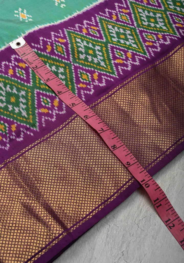 Dusty Teal Pochampally Ikkat Silk Saree and Contrast Panel Purple Ikkat Zari Border | SILK MARK CERTIFIED