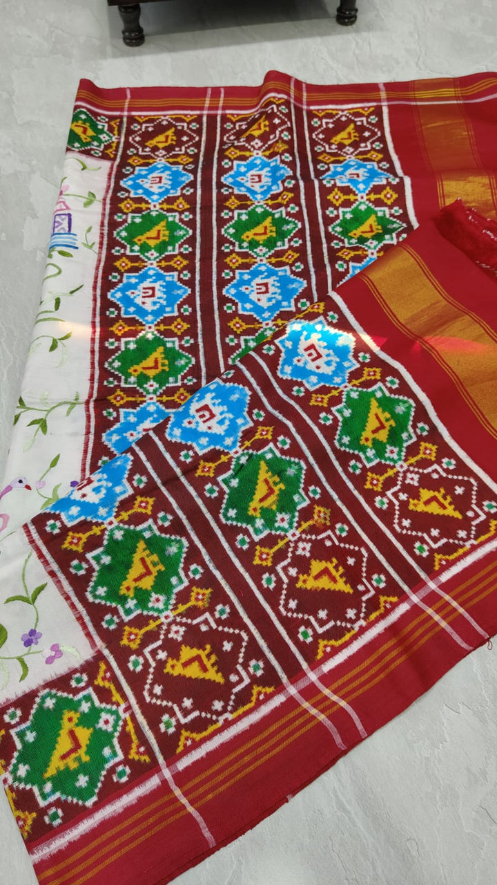 Authentic Double Ikkat Patan Patola Handwoven Silk Saree in white with handmade Parsigara embroidery | SILK MARK CERTIFIED