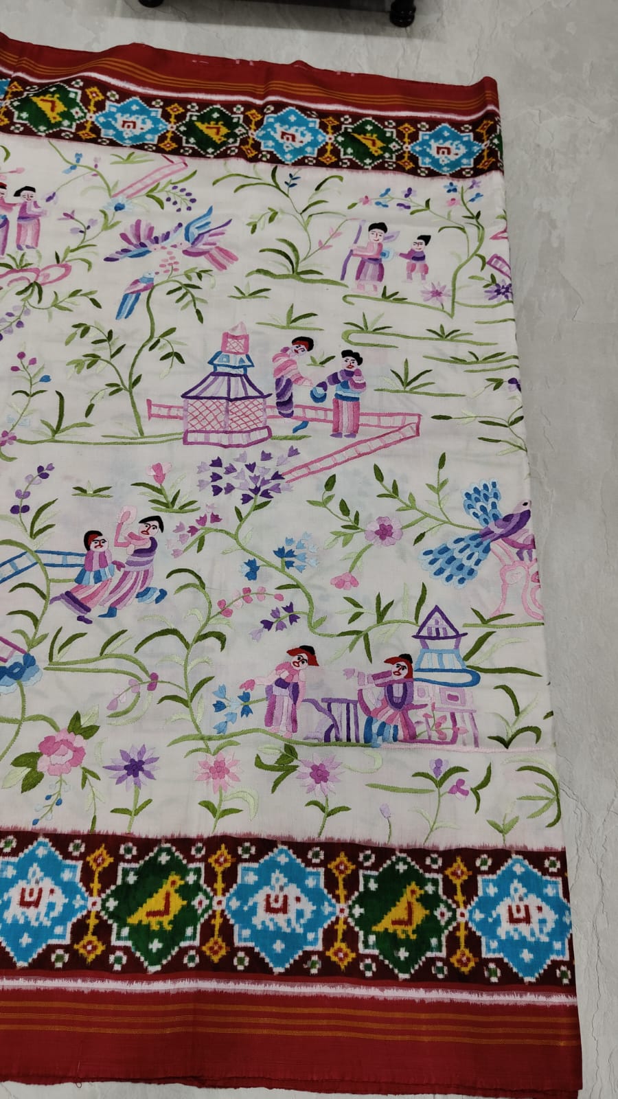 Authentic Double Ikkat Patan Patola Handwoven Silk Saree in white with handmade Parsigara embroidery | SILK MARK CERTIFIED