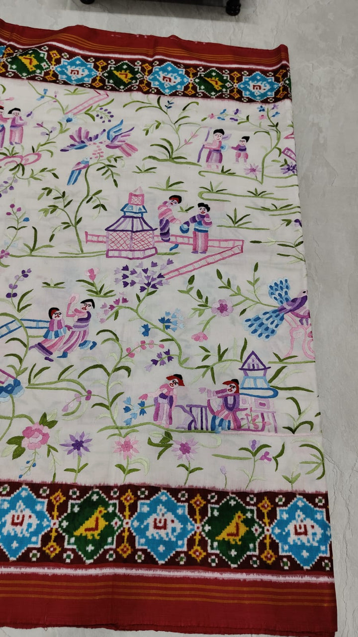 Authentic Double Ikkat Patan Patola Handwoven Silk Saree in white with handmade Parsigara embroidery | SILK MARK CERTIFIED