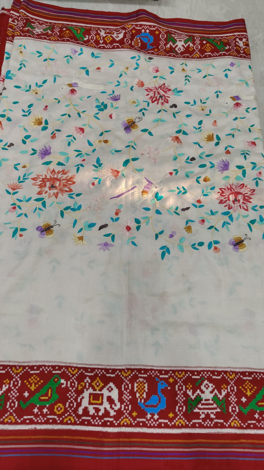 Authentic Double Ikkat Patan Patola Handwoven Silk Saree in white with handmade Parsi Gara embroidery Jugalbandi  | SILK MARK CERTIFIED