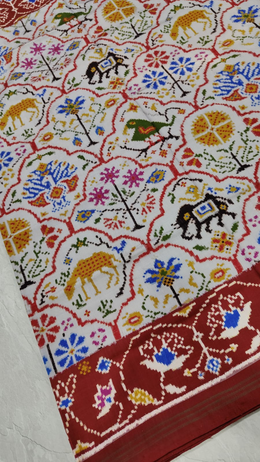 Authentic Double Ikkat Patan Patola Handwoven Saree with intricate Floral Jaal Brocade in Gray  | SILK MARK CERTIFIED