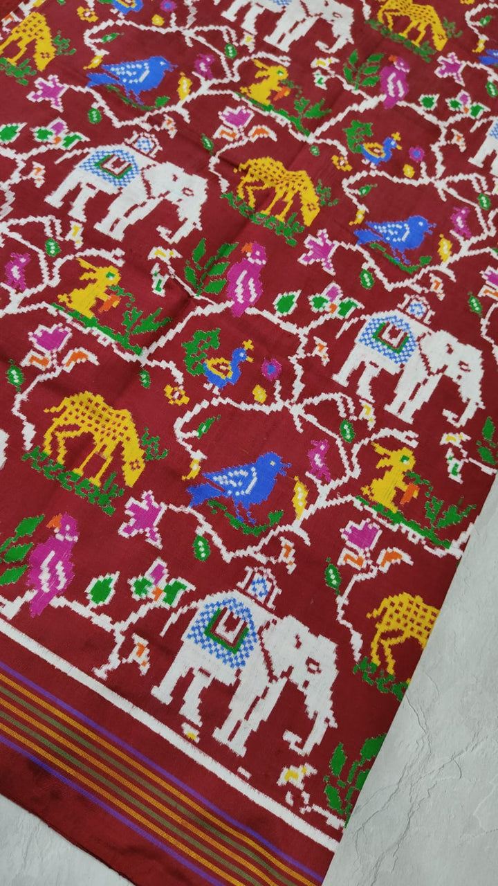 Authentic Double Ikkat Patan Patola Handwoven Saree in Maroon Jungle Theme Jaal | SILK MARK CERTIFIED