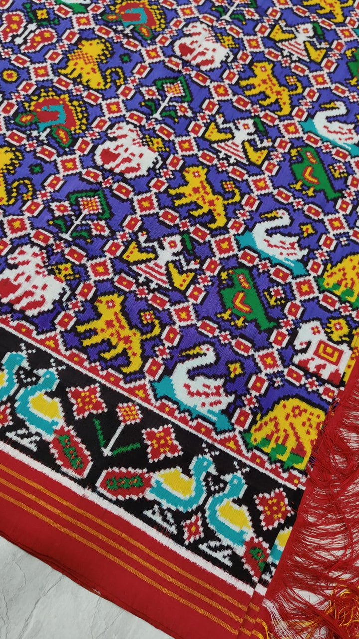 Rajvanshi - 12 Motif Patan Patola Pure Ikkat Silk Saree in Deep Purple | SILK MARK CERTIFIED