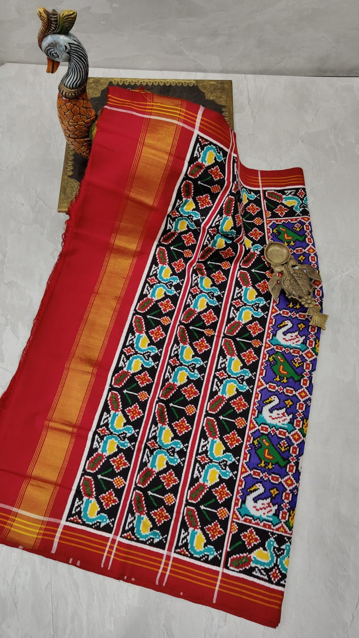 Rajvanshi - 12 Motif Patan Patola Pure Ikkat Silk Saree in Deep Purple | SILK MARK CERTIFIED