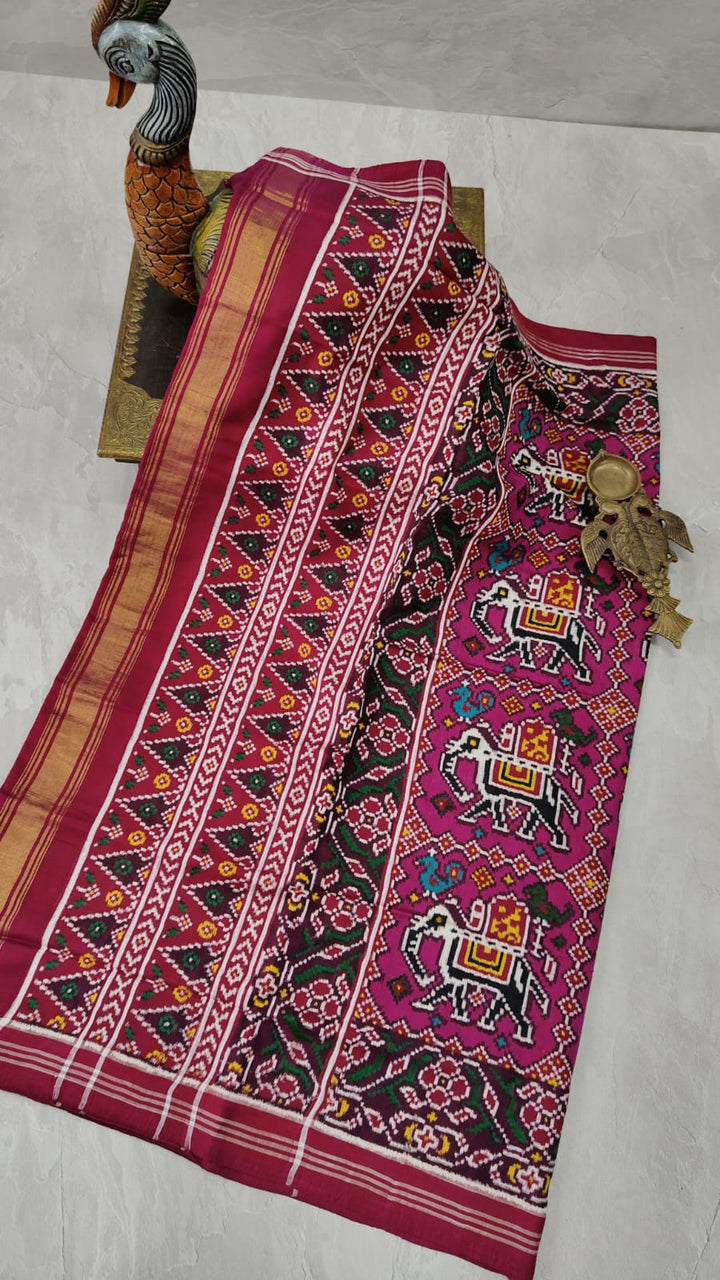 Authentic Double Ikkat Patan Patola Handwoven Saree in Magenta with Elephant Motifs | SILK MARK CERTIFIED