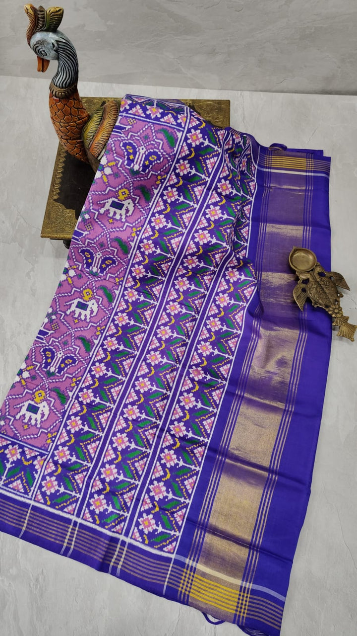 Authentic Double Ikkat Patan Patola Handwoven Saree in Lilac with Geometric Motifs | SILK MARK CERTIFIED