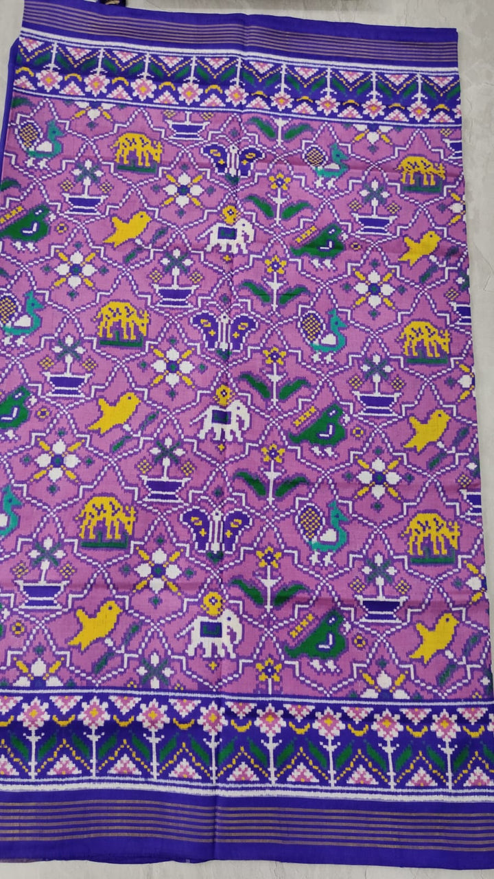 Authentic Double Ikkat Patan Patola Handwoven Saree in Lilac with Geometric Motifs | SILK MARK CERTIFIED