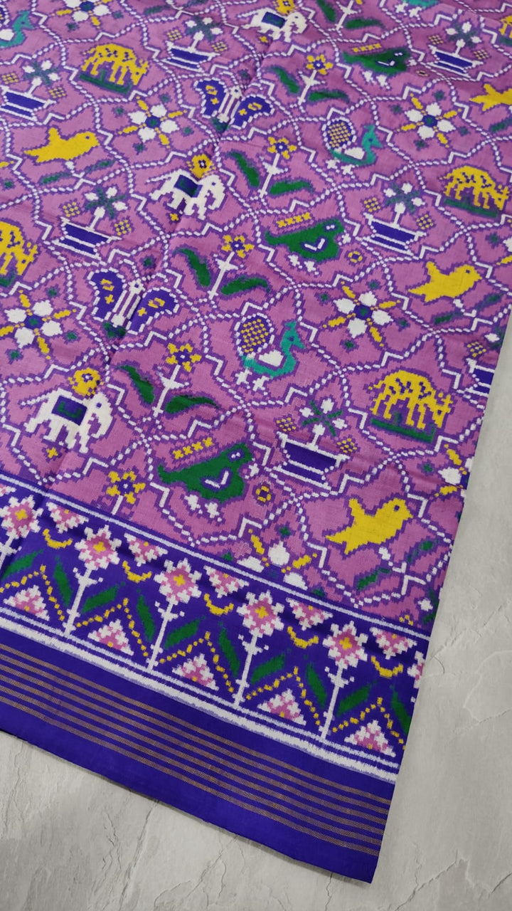 Authentic Double Ikkat Patan Patola Handwoven Saree in Lilac with Geometric Motifs | SILK MARK CERTIFIED