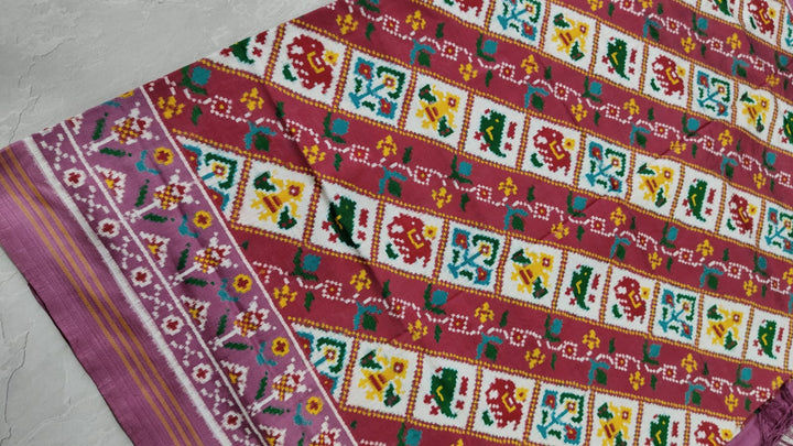 Authentic Double Ikkat Patan Patola Handwoven Saree with Diagonal Pattern in Dusty Mauve | SILK MARK CERTIFIED