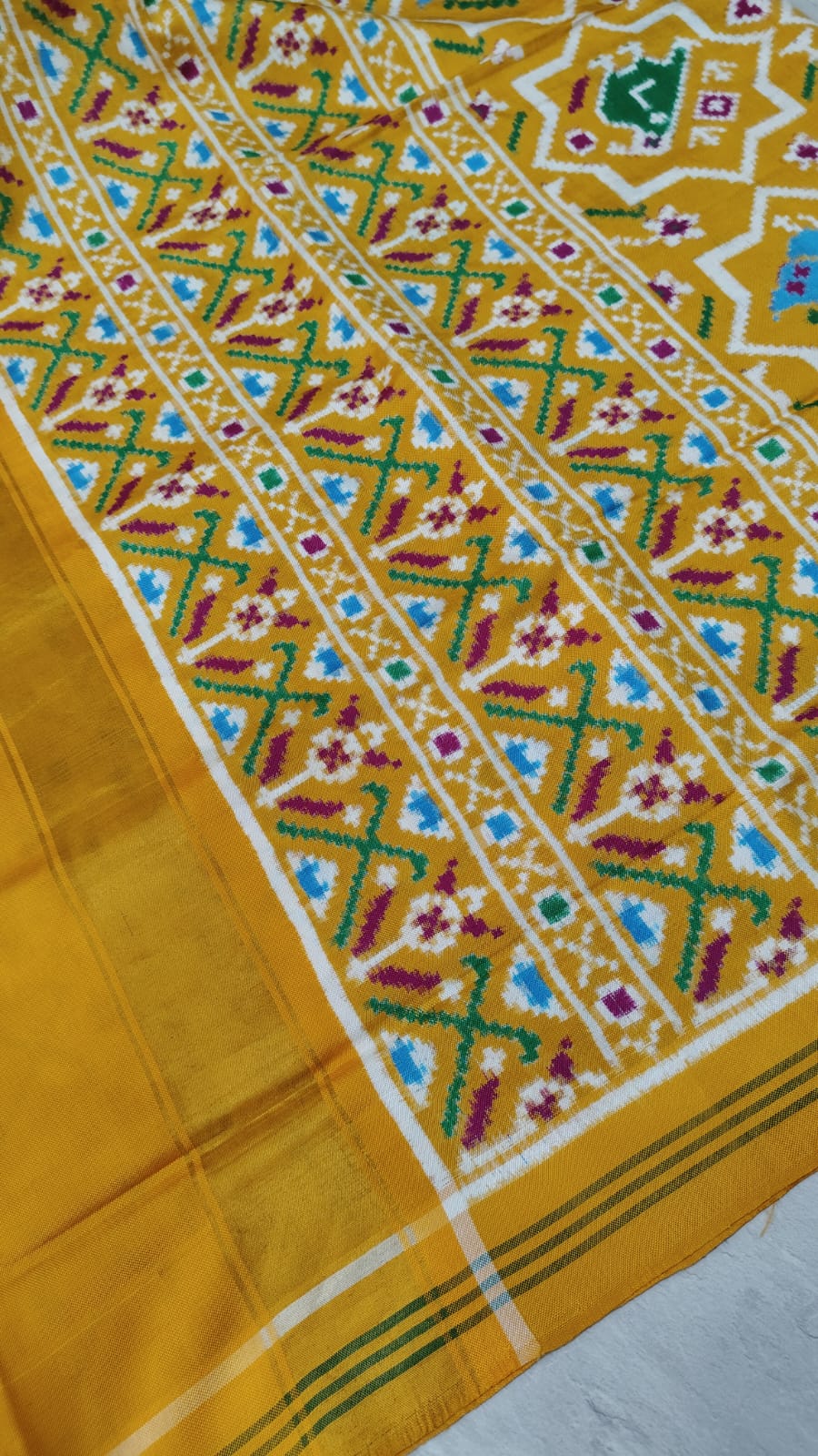 Authentic Double Ikkat Patan Patola Handwoven Saree in mustard Yellow with intricate motifs | SILK MARK CERTIFIED