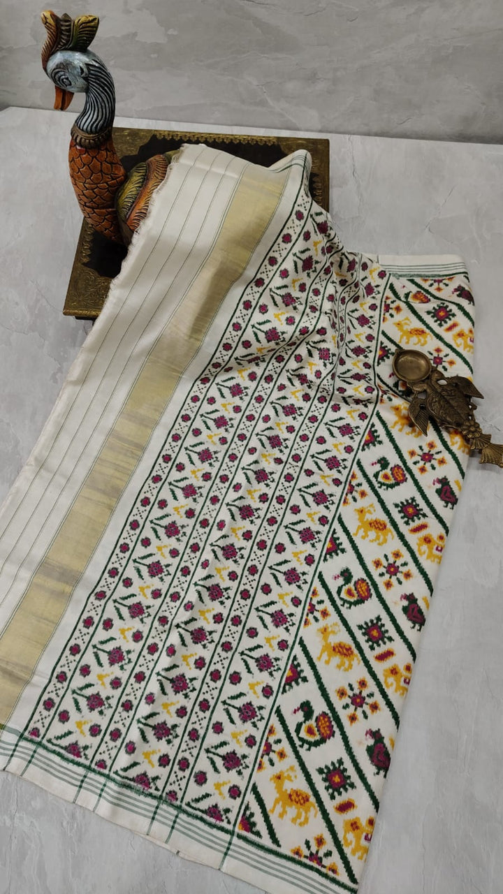 Authentic Patan Patola Double Ikkat Pure Silk Handwoven Saree in Ivory with Aada design | SILK MARK CERTIFIED