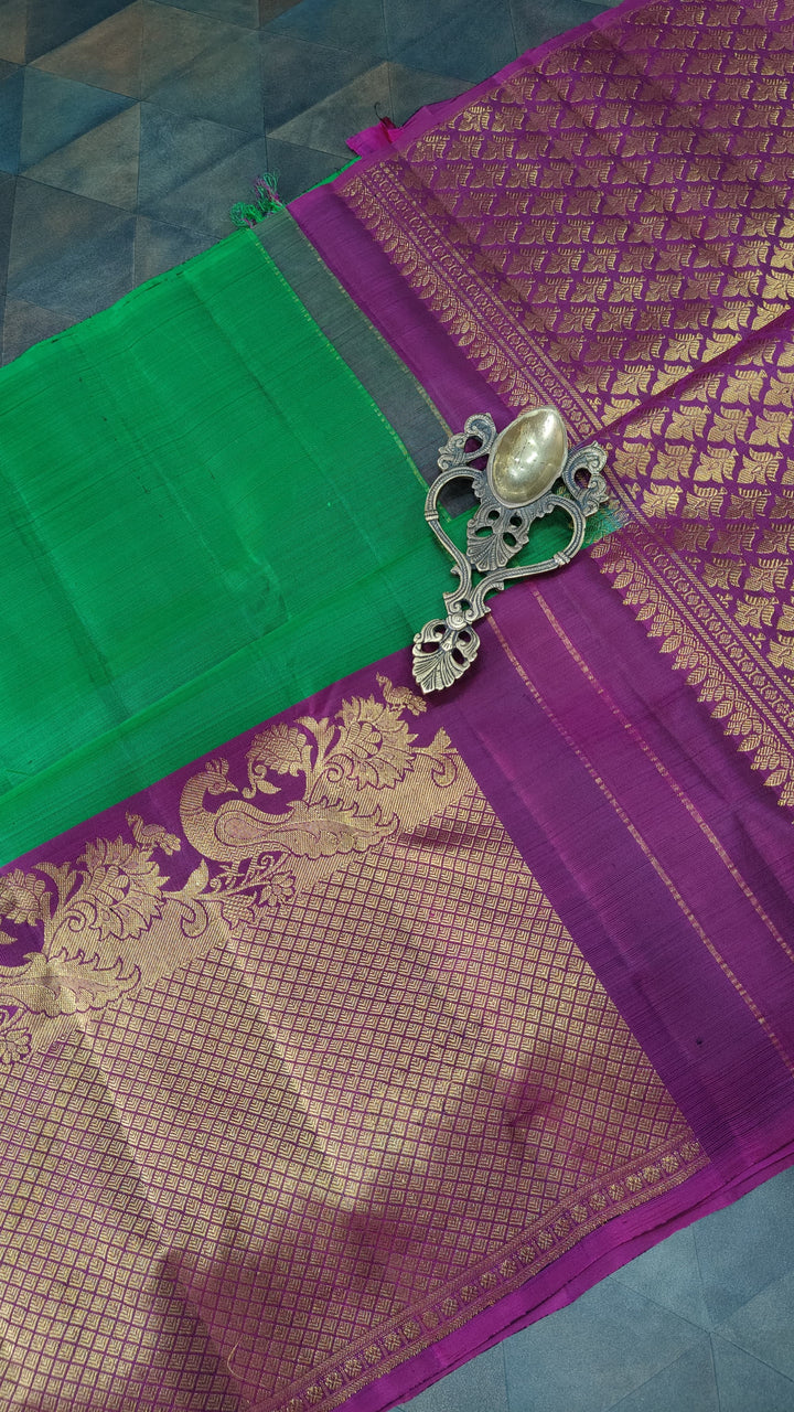 Green Kanjivaram Silk Saree with Paisley Buttas and Contrast Wide Zari Brocade Border | SILK MARK CERTIFIED