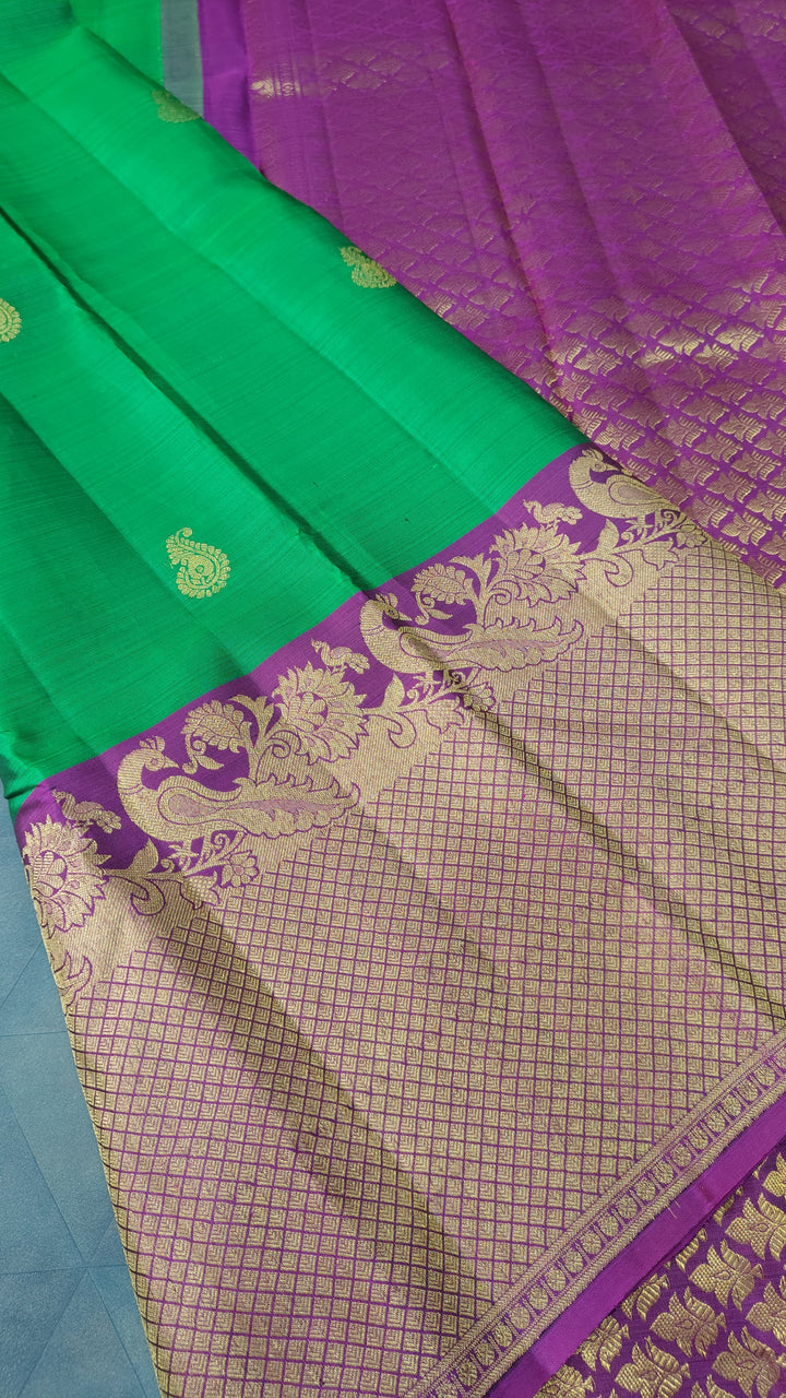 Green Kanjivaram Silk Saree with Paisley Buttas and Contrast Wide Zari Brocade Border | SILK MARK CERTIFIED