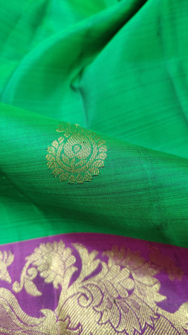 Green Kanjivaram Silk Saree with Paisley Buttas and Contrast Wide Zari Brocade Border | SILK MARK CERTIFIED