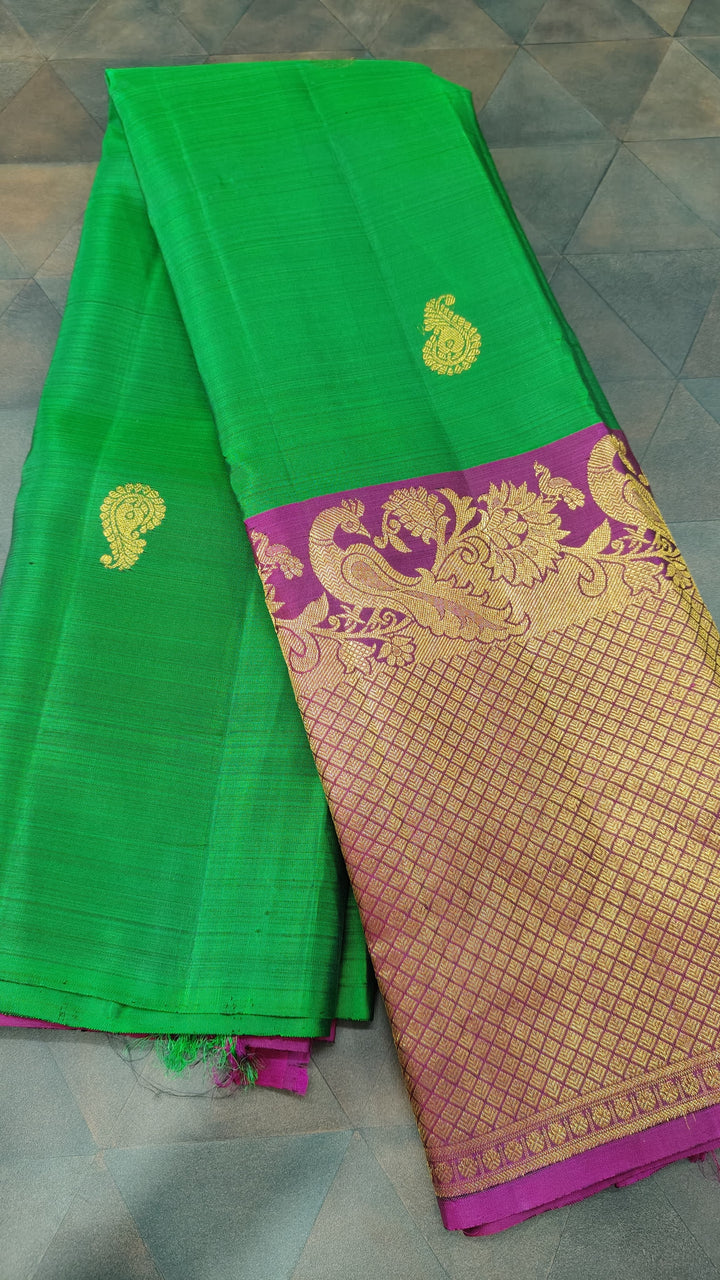 Green Kanjivaram Silk Saree with Paisley Buttas and Contrast Wide Zari Brocade Border | SILK MARK CERTIFIED