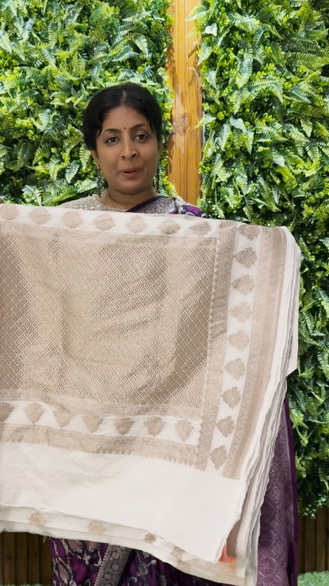 White Semi Mashru Banarasi Silk Saree with Floral Butta and Zari Border