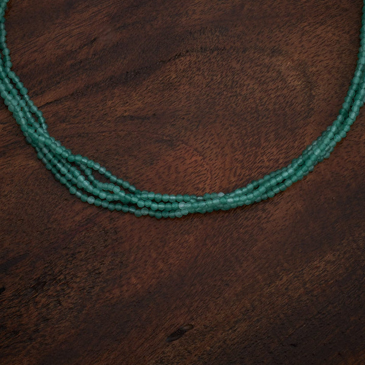 Unique Necklace Featuring Pearls and Multi-Strand Emerald Beads