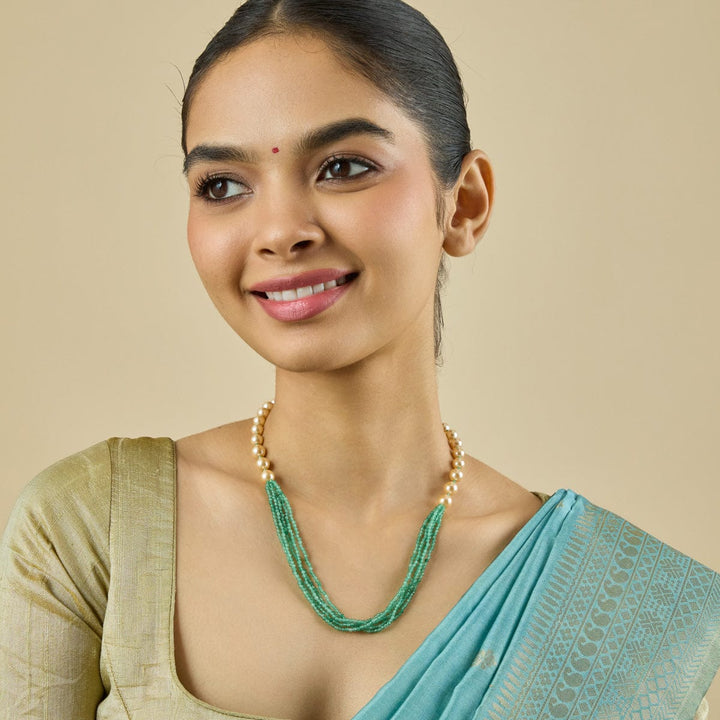 Unique Necklace Featuring Pearls and Multi-Strand Emerald Beads